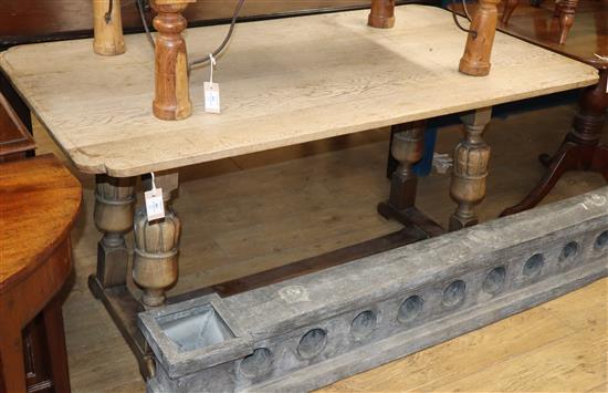 A bleached oak rectangular refectory table L.150cm